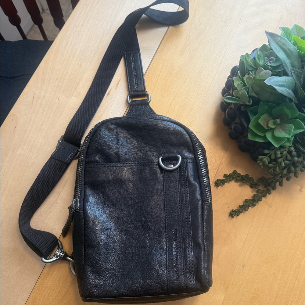SOLD. Spikes & Sparrow sling bag